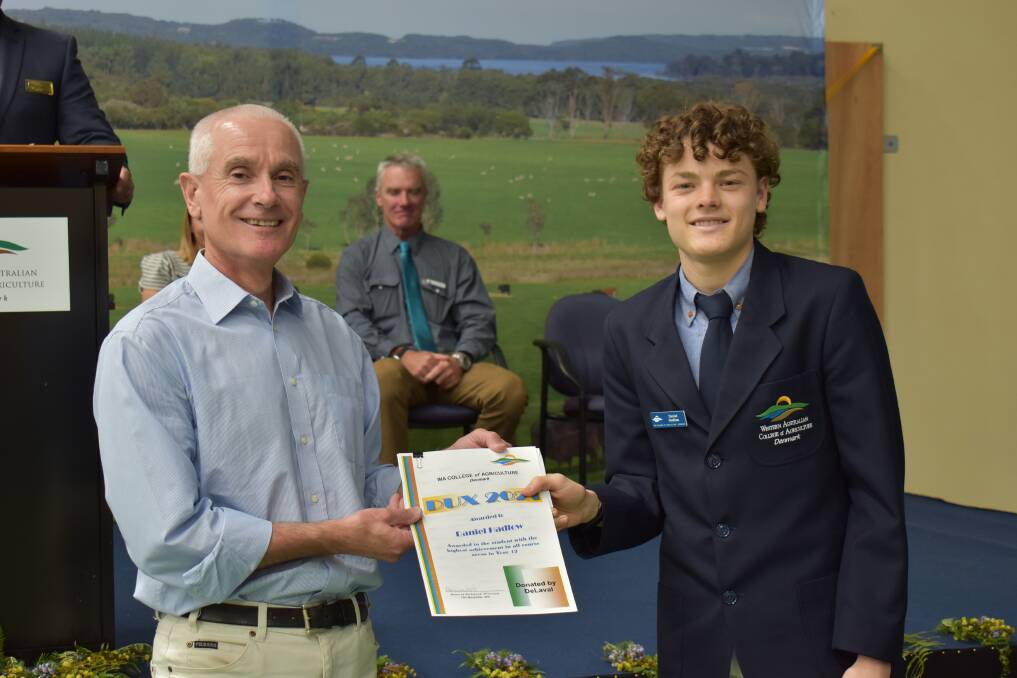 Denmark Chamber of Commerce president Chris Langslow presented Western Australian College of Agriculture (WACOA), Denmark, student Daniel Hadlow with his award as dux of the school. 