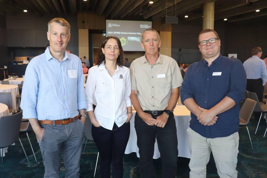DPIRD research scientists Daniel Hberli (left), Catherine Borger and Geoff Thomas, with development officer Dustin Severston were at the DPIRD Grain Industry Day to discuss the lessons about diseases, weeds and pests learned from a wet year.