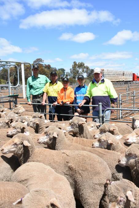 The Talbot family, NB & DL Talbot, Corrigin, sold one of the $268 equal top-priced lines of ewes at Corrigin. With the family's draft of 99 August shorn, Claypans blood ewes were Nutrien Livestock, Wickepin/Kulin/Corrigin agent Ty Miller (left) and vendors Bruce, Kieran, Asha and Norm Talbot.