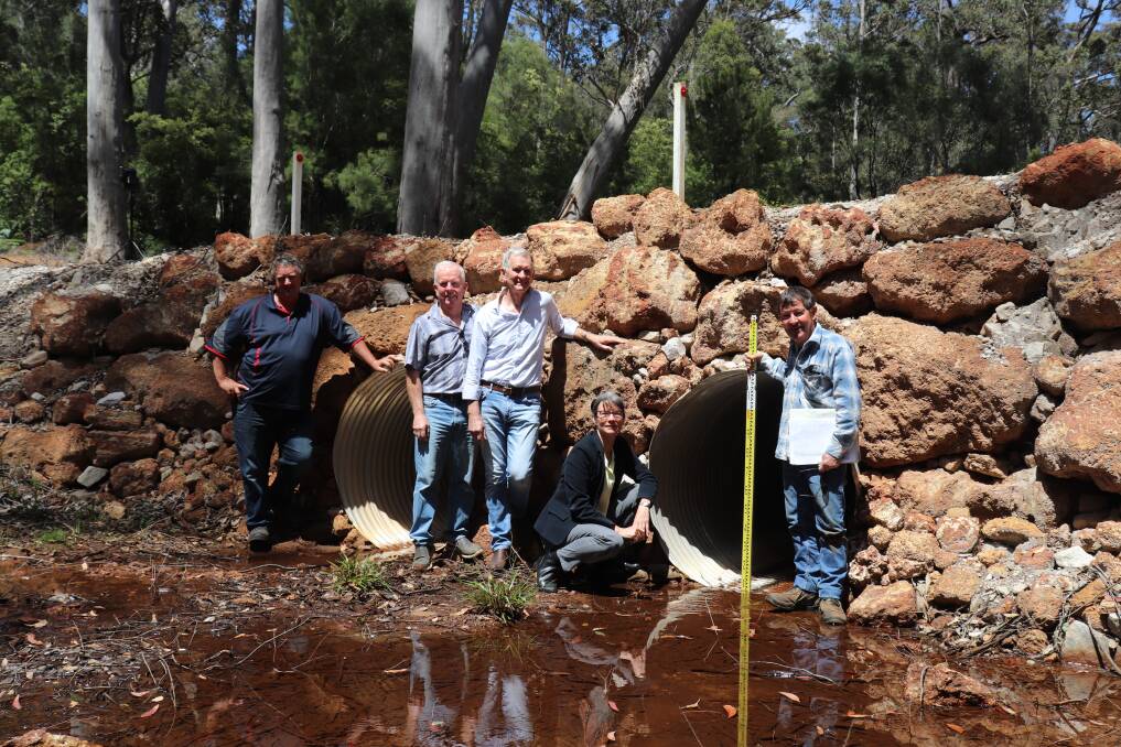 Manjimup farmers John Kilrain (left), Peter McGinty and Brian 'Barnie' Valentine (right) with hydrologist Kim Taylor and former South West Greens MLC Diane Evers on Record Brook, proposed to be dammed to store water for the Southern Forests Irrigation Scheme. A CSIRO review of water modelling used for the scheme has supported their concerns there may not be enough water into the future for the current proposal.