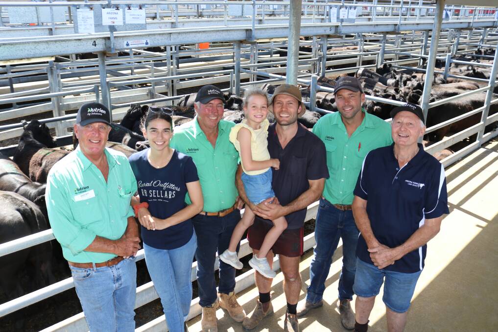 All smiles after the hugely successful sale were Nutrien Livestock southern manager Bob Pumphrey (left), with the day's major volume vendors Arizona Farms, Lake Grace, connection Georgie Sanchez, Garry Prater, Nutrien Livestock, Lake Grace, Eva, 7 and her father Luke Bairstow, Arizona Farms, Tyson Prater, Nutrien Livestock, Lake Grace and Noel Bairstow.