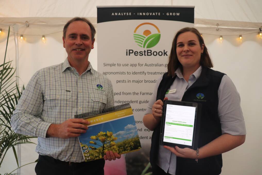 Farmanco's original Pestbook, held by chief executive officer Keith Symondson, has been turned into an app as shown by product manager Georgia King.