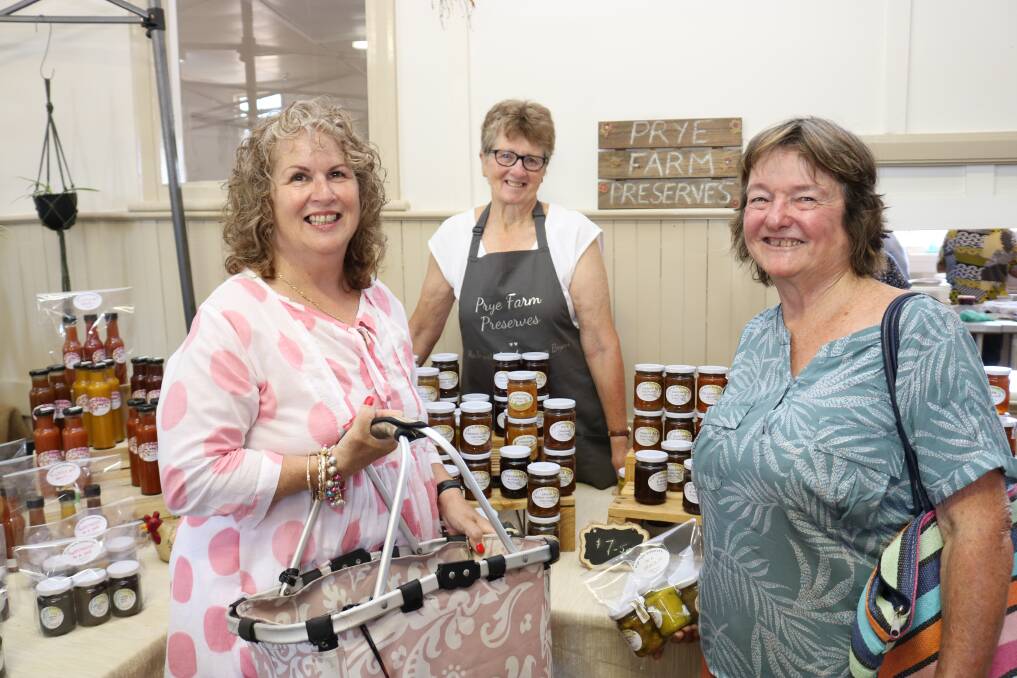 Barbara Jamieson (left) and Wendy Hoffman (right), Bejoording, were keen to get some jams and relishes from Karyn Bryan, Prye Farm Preserves, Moora.