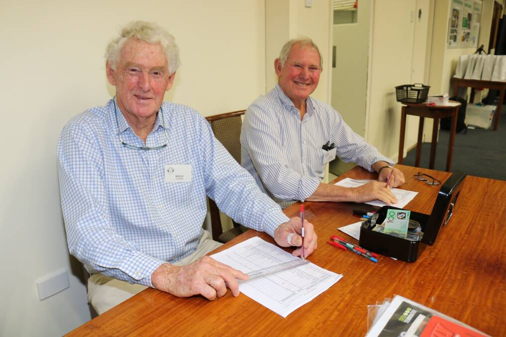 Old Ram Muster committee members Brian Cooper (left), Claremont and Ross Finlayson, Mosman Park,welcomed guests and kept the money side in order.