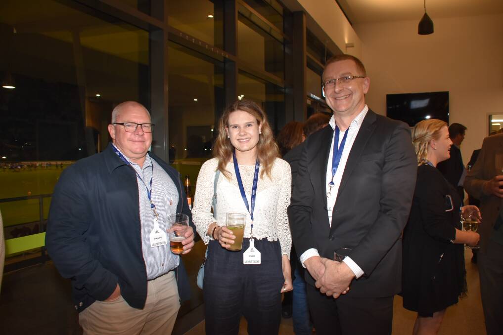 Queensland consultant Damian Barsby (left), caught up with Harvest Road backgrounding co-ordinator Claire Harcourt-Smith and Harvest Road chief operating officer processing, Wayne Shaw, before dinner.