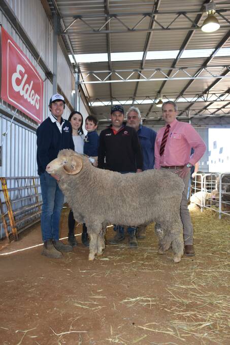 With the $9500 top-priced Poll Merino ram at the Kolindale on-property ram sale at Dudinin last Monday were Kolindale co-principals Daniela (left) Varone and Luke Ledwith with nephew Harry Hunter and son Louis, Kolindale connection Colin Lewis, buyers Linda, Zoe, Sean, Amy and Peter McCrea, Salmon Gums and Elders State general manager WA Nick Fazekas.