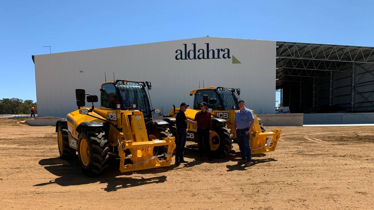 Aldahra general manager Keith Coakley (left) with Boekeman Machinery sales consultant Ben Boekeman and Aldahra production manager Tony Thompson at the upgraded Wannamal hay export plant.