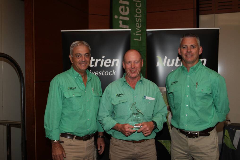 Nutrien Ag Solutions managing director Rob Clayton (right) and Nutrien Livestock State manager Leon Giglia (left) presented Nutrien Livestock Cranbrook and surrounds representative Dan Cale with a recognition award for his valued contribution to the business.