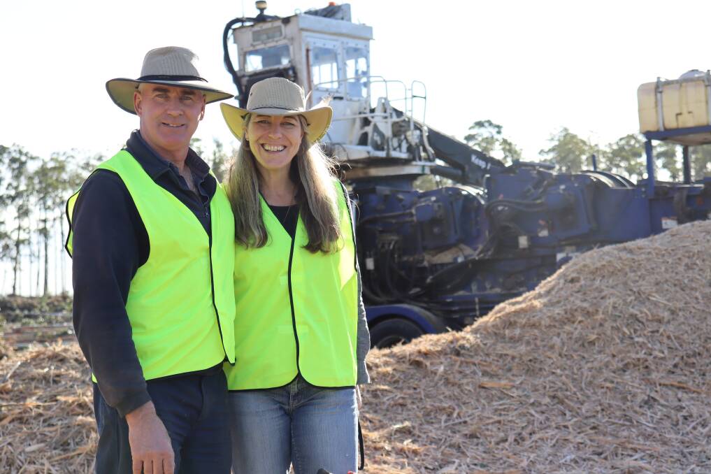 Esperance farmer Andrew Middleton with partner Renae Poot watch on as blue gum trees are harvested at the Merivale property in July.