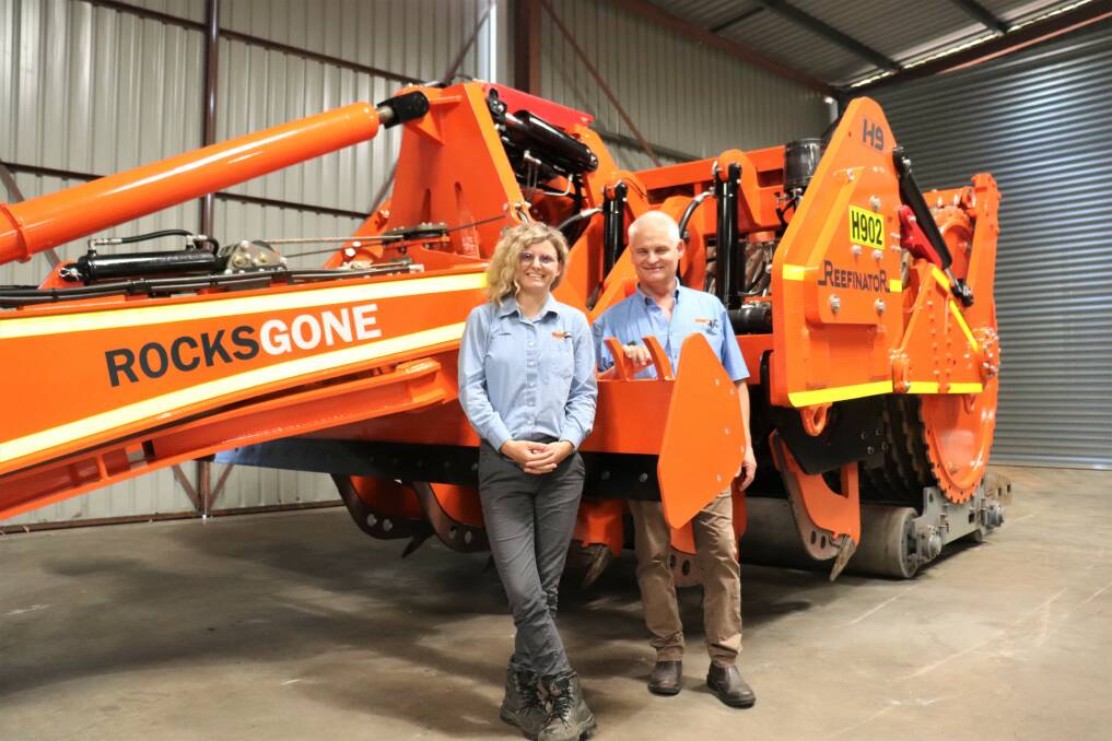 Rocks Gone is a family business. Daughter and marketing manager Joanne Pannell and father and managing director Tim Pannell show off the first production Reefinator H9 model designed for the road construction industry.