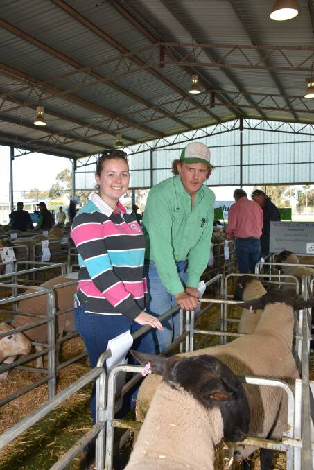 Looking over the team of Suffolks offered by the Kirrie stud were stud principal Kira Batterbee and Nutrien Livestock, Williams representative Louis Payne.