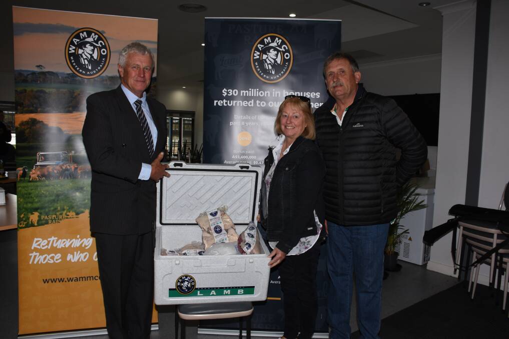 WAMMCO chairman Craig Heggaton (left) congratulated Viv and Ken Hoey, KD & VG Hoey, Esperance, on placing second in the large crossbred supplier category.