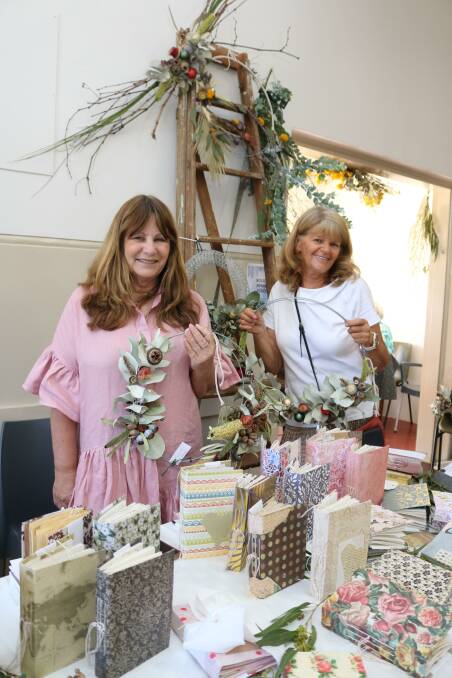 Gloria Hayden (left), Junk Journals by G, Metricup, sold handmade journals, while her friend Lynlee Chitty, Toodyay, sold native bush floral arrangements and also donated her time to dress up the Bolgart Hall with her floral artworks.