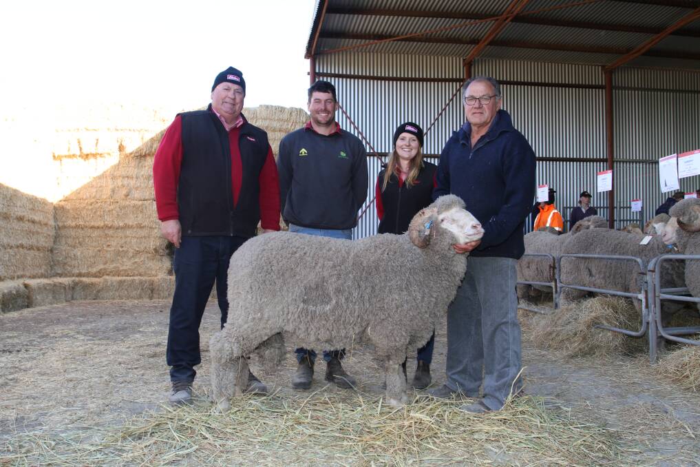 With the $4000 top-priced Merino ram at the Cardiff Merino and Poll Merino stud's third annual on-property ram sale at Yorkrakine on September 3 were Cardiff stud classer Kevin Broad (left), Elders stud stock, buyer Glenn Smith, Wongamine Grazing, Northam, Elders Wheatbelt wool representative Brianna Hayes and Cardiff stud principal Quentin Davies.