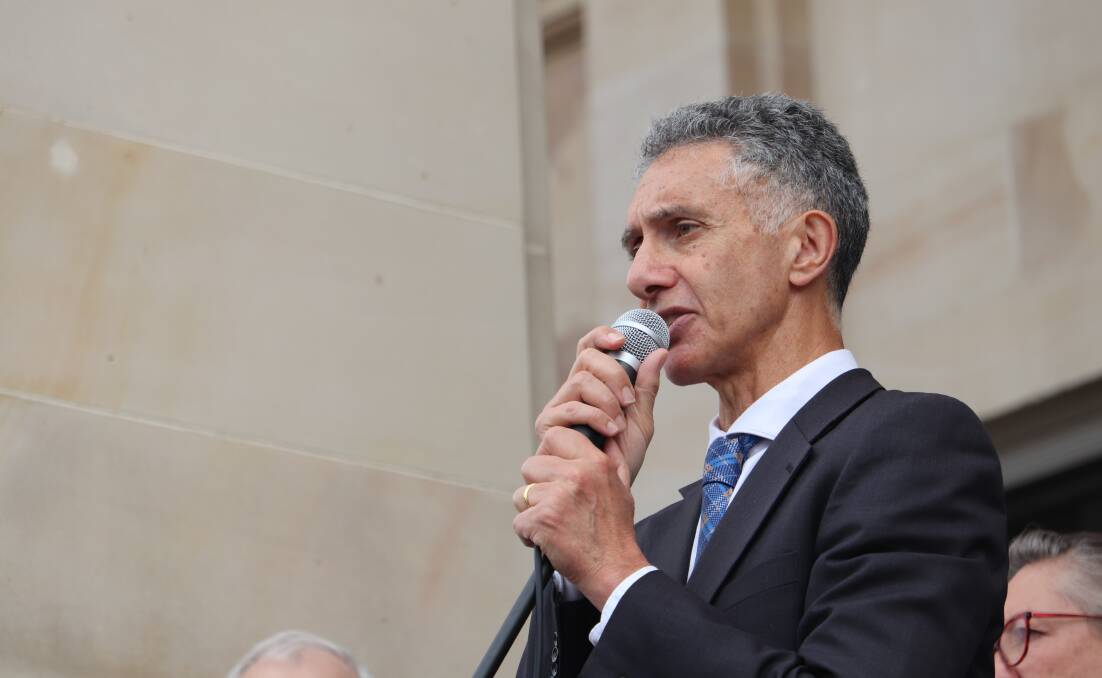 WA's Aboriginal Affairs Minister Tony Buti speaking to the hundreds of farmers and pastoralists who gathered outside Parliament House on Tuesday to oppose the 2021 Aboriginal Cultural Heritage Act,which is now set to be repealed.
