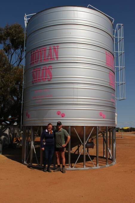 Tegan and Avery Maitland, Yorkrakine, purchased the 2700 bushel pink stenciled silo donated by Moylan Silos, Kellerberrin, for $20,000 at the charity auction.