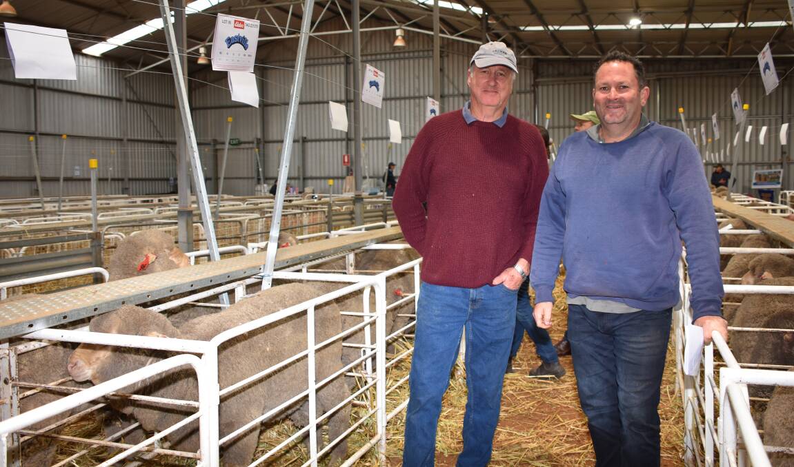 Long-term clients Alf (left) and Adam Watts, LR Watts & Co, Pingelly, were one of the major buyers purchasing 16 rams to a top of $1500 twice and an average of $1075.