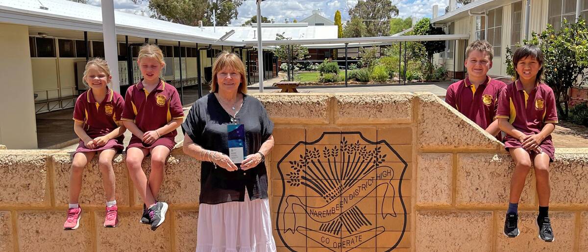 Narembeen Primary and District High School principal Chris Arnold with students, celebrating the teaching and learning award at the end of last year. Picture: Supplied