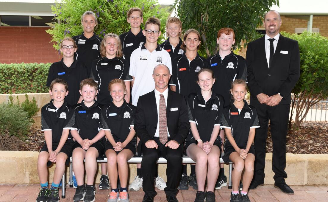The 2022 student council and faction captains, with principal Jonathan Arnott (front row) and associate principal Paul Jasper (right). 