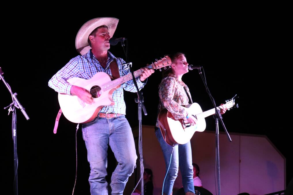 Golden Guitar winner Tom Curtain, Katherine Outback Experience, NT, on stage with country singer Kate Hindle, Collie.