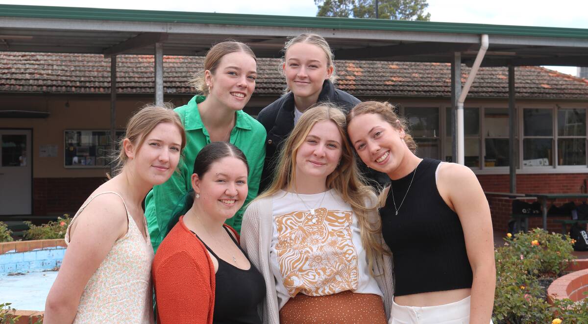 Six of Narrogin Senior High School's top year 12 achievers for 2022 reunited for the first assembly of the 2023 school year. Chloe Bertuola (left), Bree-Anna Neretlis, Courtney Dewing and ATAR dux Chelsea Mulcahy, with Abbie Smith (back row left) and Zahlee Buck said they had lots of support from their teachers which helped them to succeed.