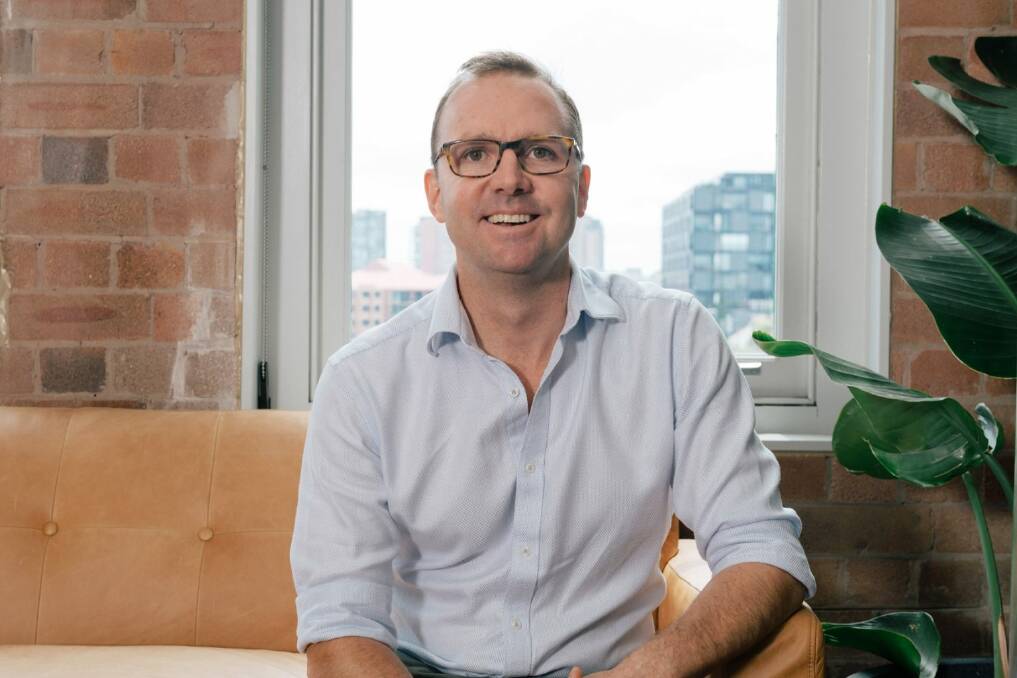 Connor FitzGerald at his workplace in Sydney with the Fulton Market Group (FMG).