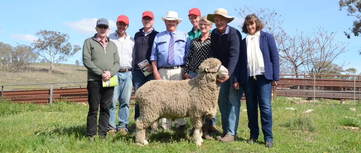 David Costigin, Norm Smith (Glenwood), Mark Copsey, Allworths, Sydney, Bruce Bryant, Will and Pip Smith, and buyers Adrian and Elizabeth Betts with the $5000 ram.