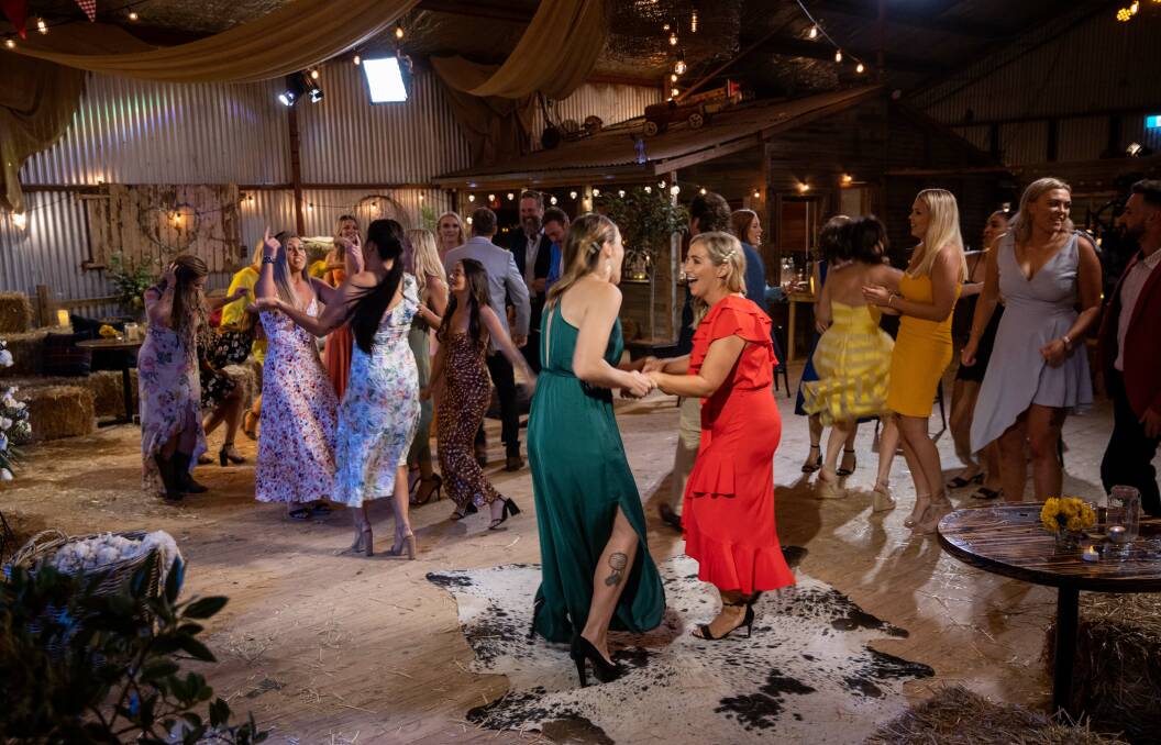 CUTTING A RUG: The lack of males did nothing to help with the awkward dancing at the country ball on episode 7 of Farmer Wants a Wife. 