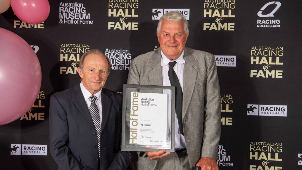 INDUCTED: Vo Rogue's jockey Cyril Small and co-owner Jeff Perry with Vo Rogue's Hall of Fame plaque. Photo: Michael McInally/RQ
