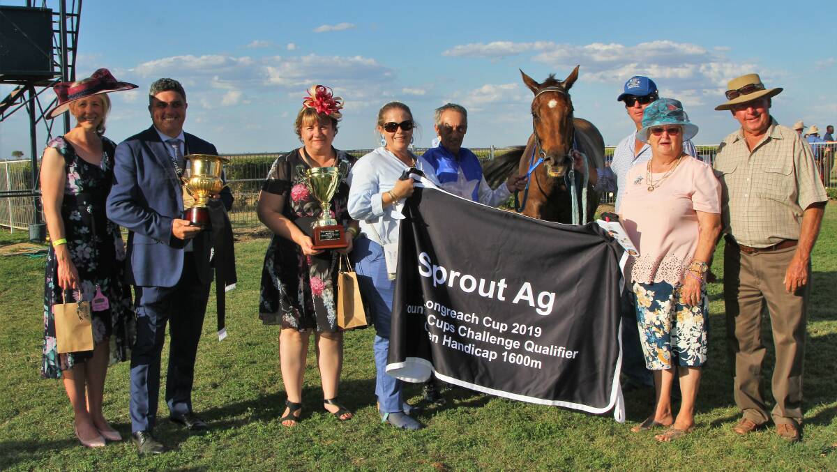 Longreach Cup: Sponsors Jo and Breckon Curtis, and Tanya Kamerling, Sproutag, make the presentation to French Hussler's owners Toni Austin and Pam Carolan, pictured with jockey Stanley Watkin, trainer Todd Austin and Bob Carolan. Picture: Sally Cripps