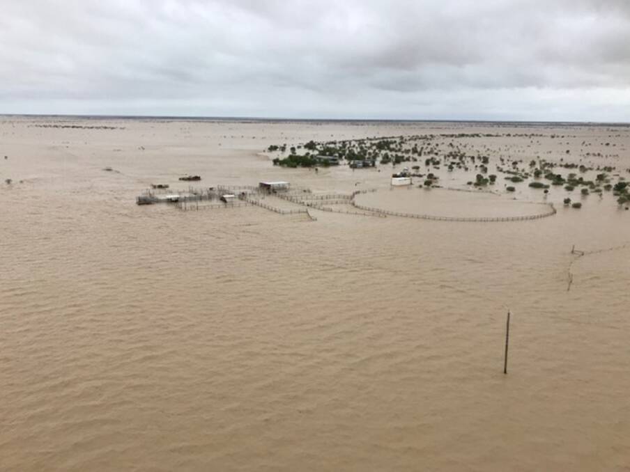 The homestead and yards at Channel Downs, south of Nelia, photographed by Ergon Energy at the height of the flooding.