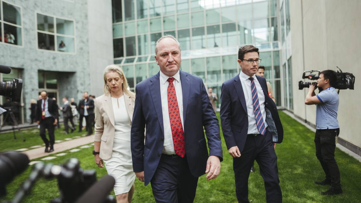 Barnaby Joyce (centre) with Nationals Bridget McKenzie and David Littleproud after he regained party leadership. Photo: Dion Georgopoulos 