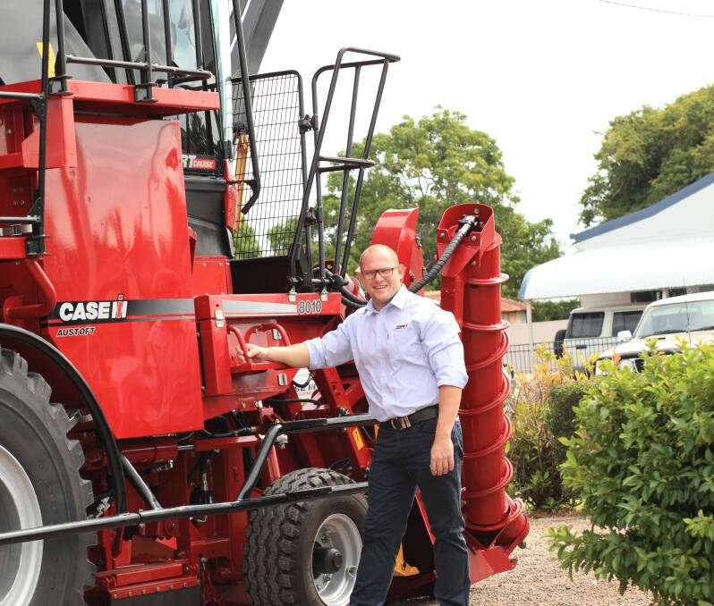 LUMPS OF PRAISE: Case IH Australia product manager for sugarcane harvesters in Australia, Lawrence Polga (pictured with an 8010 machine), said the award for the 8810 model harvester was a testament to its quality, efficiency, high performance and technology.