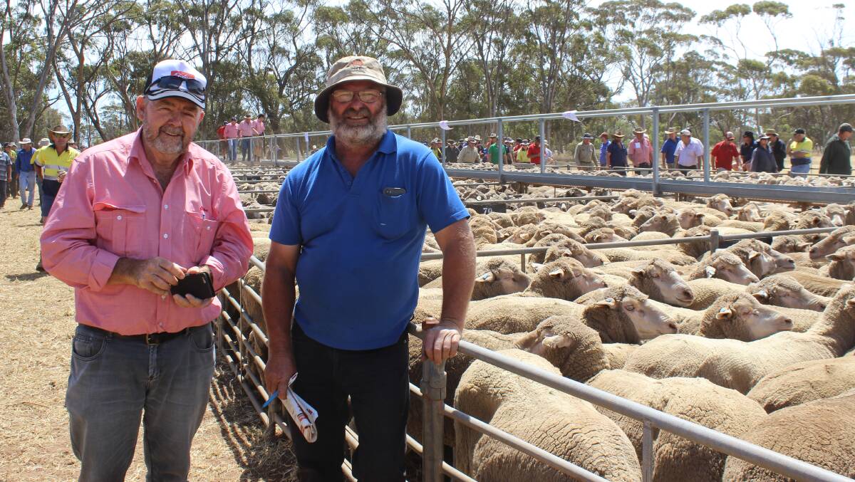 Pictured together after successfully bidding on a couple of lines of Merino ewes at Moora last week were Elders Avon Valley representative Lynton Saunders (left), with buyer Jamie Perry, Copley, who paid the sale top price of $201 for a pen of 290 July shorn, Parakeelya blood 3.5yo ewes.