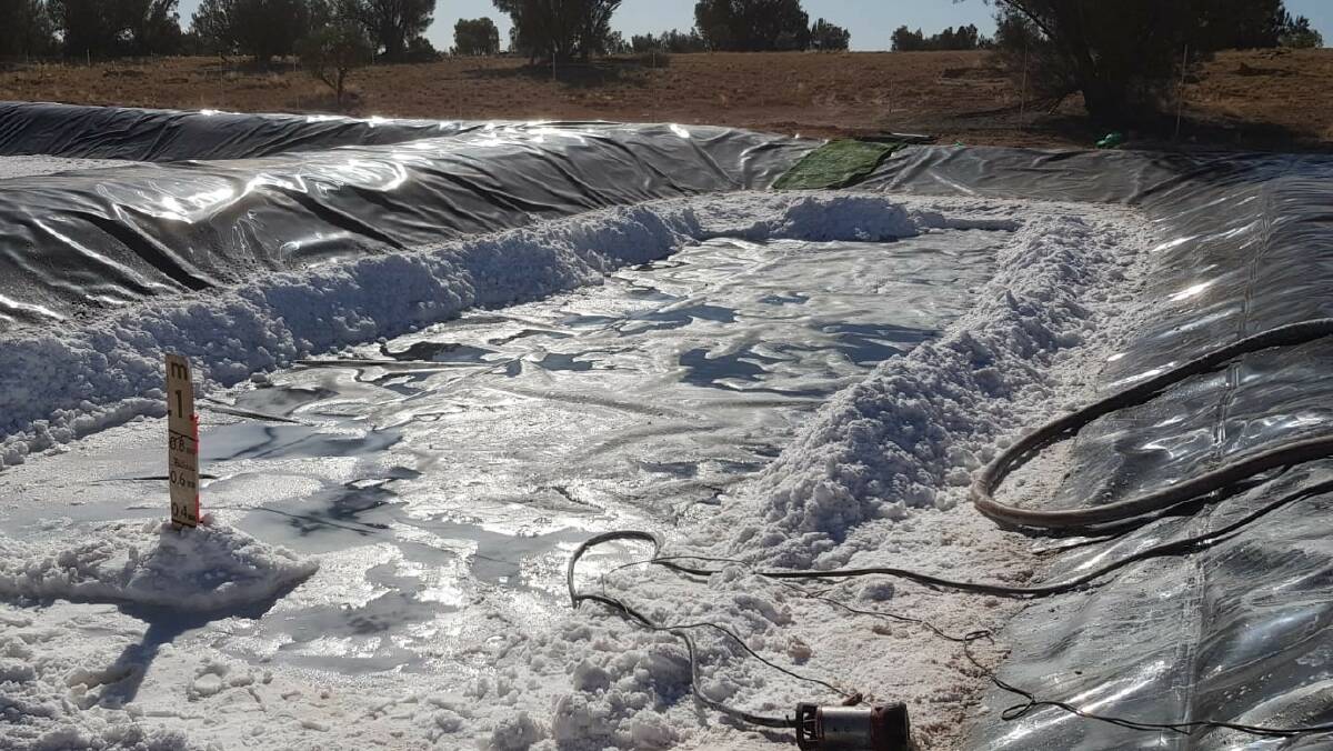 Potassium and sulphate salts piled on the floor of Australian Potash's pilot first harvest evaporation pond at Lake Wells in the northern Goldfields.