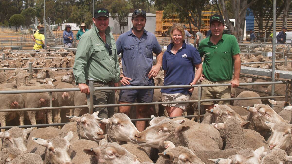 With some of the line of 363 October shorn Chirniminup Dohne blood 3.5-year-old ewes which topped the Landmark special ewe sale at Wickepin last week at $176 were Landmark Brookton Pingelly agent Chris Turton (left) with his client and top-priced ewe vendor Matt Cunningham, ML & BM Cunningham, Pingelly, buyer Michelle Ball, Dumbleyung her Landmark Dumbleyung livestock agent Scott Jefferis. The Balls bought all three lines of Dohne ewes offered by the Cunningham family.