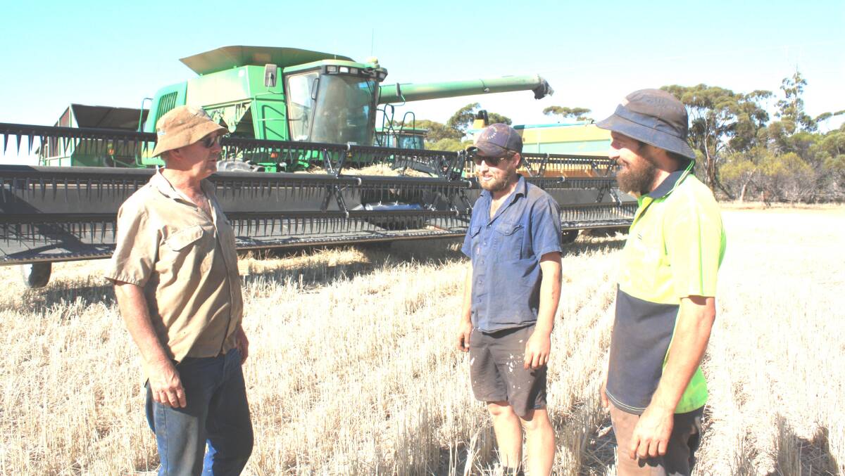 Closing in on the finish of harvest, with more than 80 per cent of the program completed when Farm Weekly visited in mid-December, were Xantippe farmers Steven Carter (left) and his sons Todd and Gavin. "We've been lucky with a fairly good season," Steven said. "We had a dry September but the crops weren't as bad as I thought they would be and the quality is excellent, with negligible screenings.  "Probably the only blemish was canola which looked really good but ran out of moisture. "We're taking off Cobra wheat here and it's going between one and 2.5 tonnes (a hectare)." Photo: Ken Wilson.
