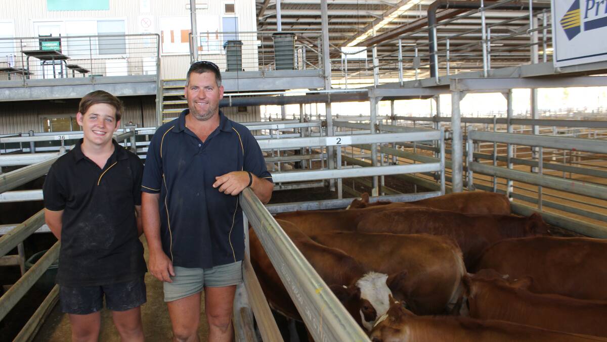 Pictured before the sale at Muchea on Friday with their champion pen of heavy Simmental cross steers were Jack (left) and Gavin Read, Gingin.