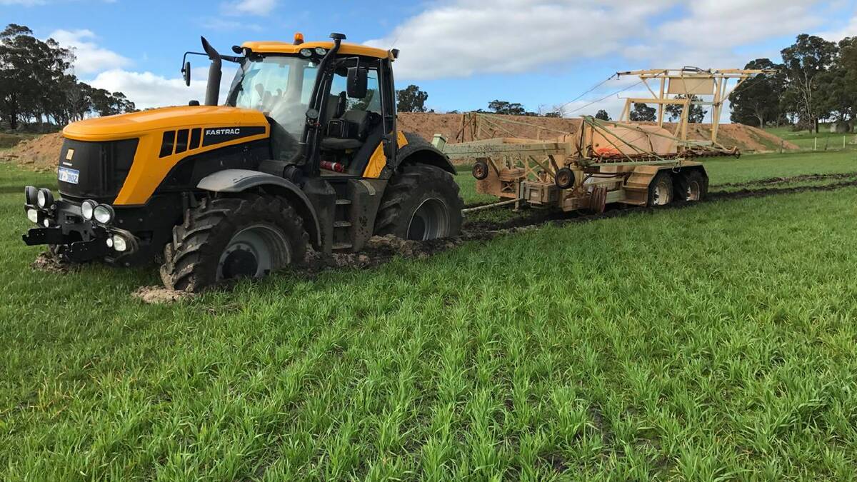 Darkan farmer Mitch Lubcke found himself in a sticky situation while he was out spraying in July. Mr Lubcke said this was the first time he had been bogged in six years.