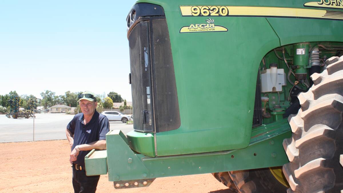 Providing a blast from the past is former T & H Walton Stores' service manager Wayne Barry, who was in sales mode when Farm Weekly caught up with him. "Well this old girl is going out the door for a really good price," Wayne said. "It's a 9620 on triples with 5700 hours and the boys are looking for $110,000 plus GST. Naturally it has been serviced and is in really good order. Ring our salesman Fin Brown for more information."