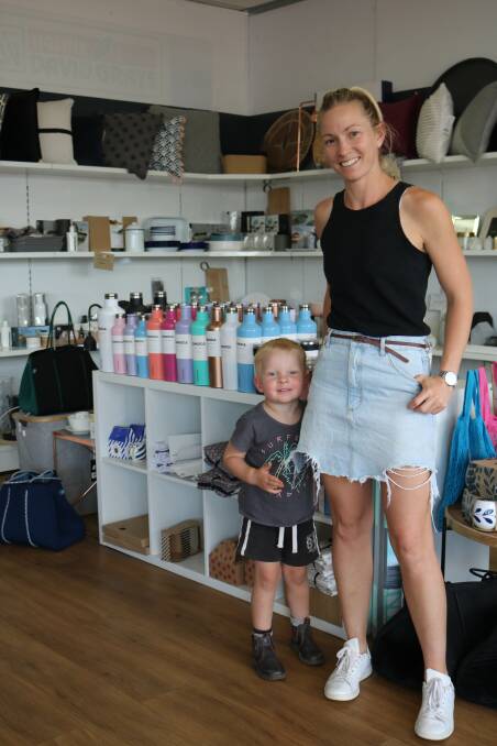 Narembeen local Anita Parsons with her son Jye (nearly 3) making sure the merchandising is on point in Three-0-Two, the home and giftware business Anita runs in conjunction with Amy Hardham.