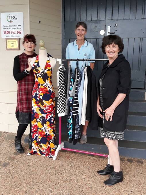 Walk-In Wardrobe organisers Meg Stansfield (left) and Binny Henricks (right), and Anne Watkins from CWA Atherton outside the Yungaburra Community Hall where the Walk-in Wardrobe event will be held on Saturday 8 May.