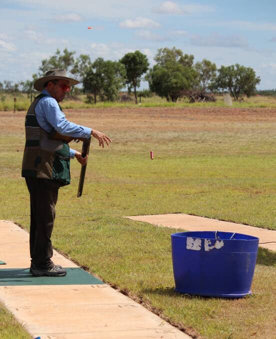 FIRE AWAY: AA Grade shooter Rod Cusack throws his empty shell in the bin after a strong presence in the Double Barrel event. Photos: Samantha Walton.