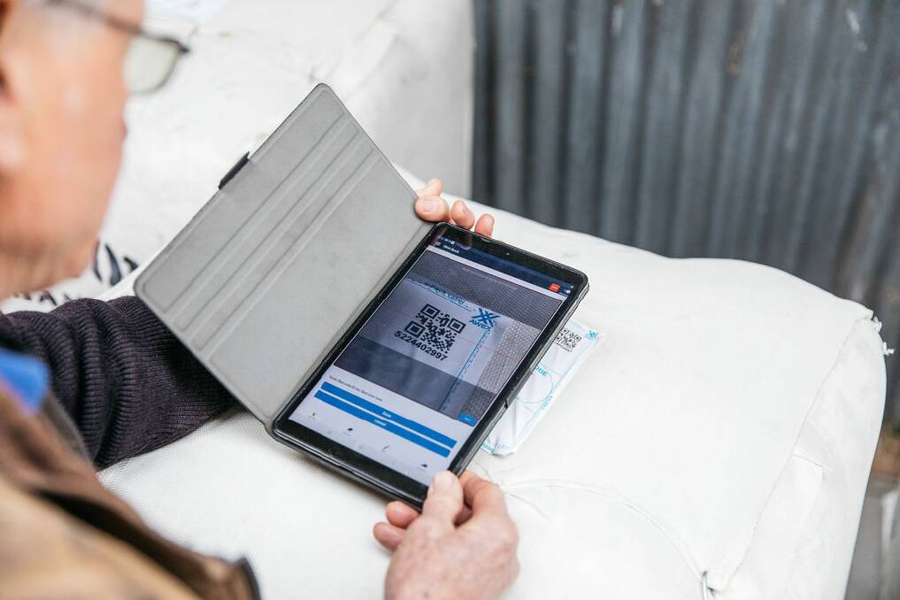 A Tasmanian grower has become the first to commercially use specially designed wool packs with RFID and QR code technology. Photo- Melanie Kate Photography