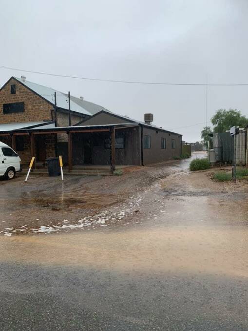 Water racing aorund the Country Corner Store at Tibooburra in far oiutbak NSW this morning with 120mm of rain recorded and more on the way. Photo courtesy of Vicki Jackson.
