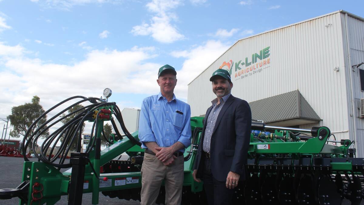 Bill Larsen and Brandon Stannett at K-Line Ag's facility in Cowra, NSW, where an anniversary celebration was held last month.