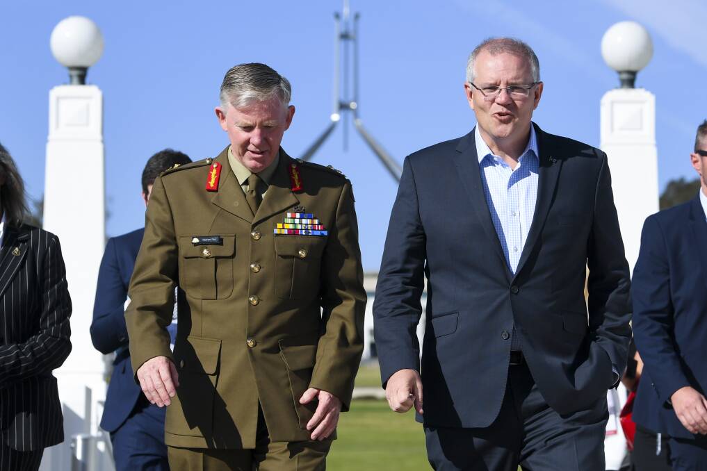Coordinator-General for Drought, Major General Stephen Day and Prime Minister Scott Morrison arriving at the National Drought Summit at Old Parliament House in Canberra today. Phoot by Lukas Coch. 