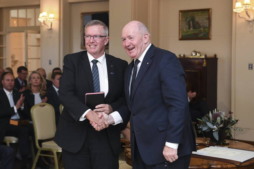 Parkes MP Mark Coulton is sworn in to the federal ministry by Australian Governor-General Sir Peter Cosgrove in Canberra last week. Photo by Lukas Coch.