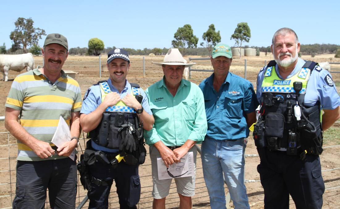 Local Boyup Brook police team members constable Danny Drummond (second left) and sergeant Marty Baraiolo called into Venturon sale and caught up with John Miell (left), JR & WR Miell, Narrikup, who purchased two Charolais bulls for $10,000 and $8000, Terry Zambonetti, Nutrien Livestock, Albany and Stewart Smith, Narrikup.
