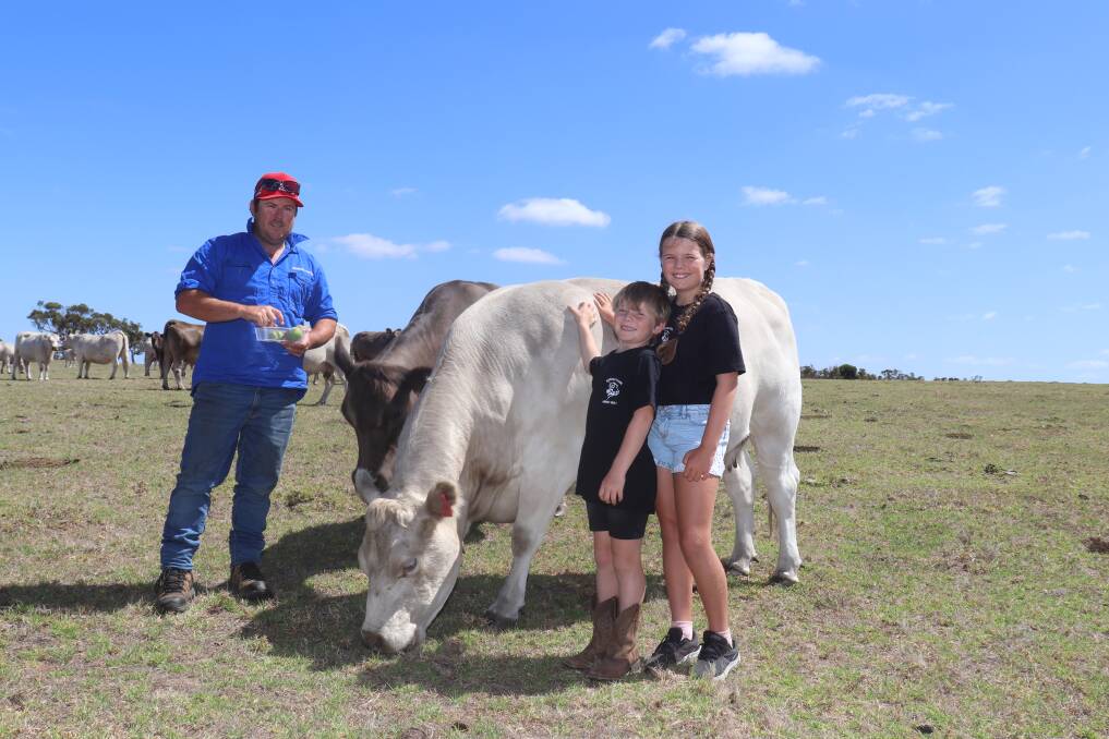 Les Duncan (left) with his two children Harry and Maddi with some of their stock at their Redmond-based property that spreads across 1200 hectares of land which is split into six properties in the area owned by the Duncan family.
